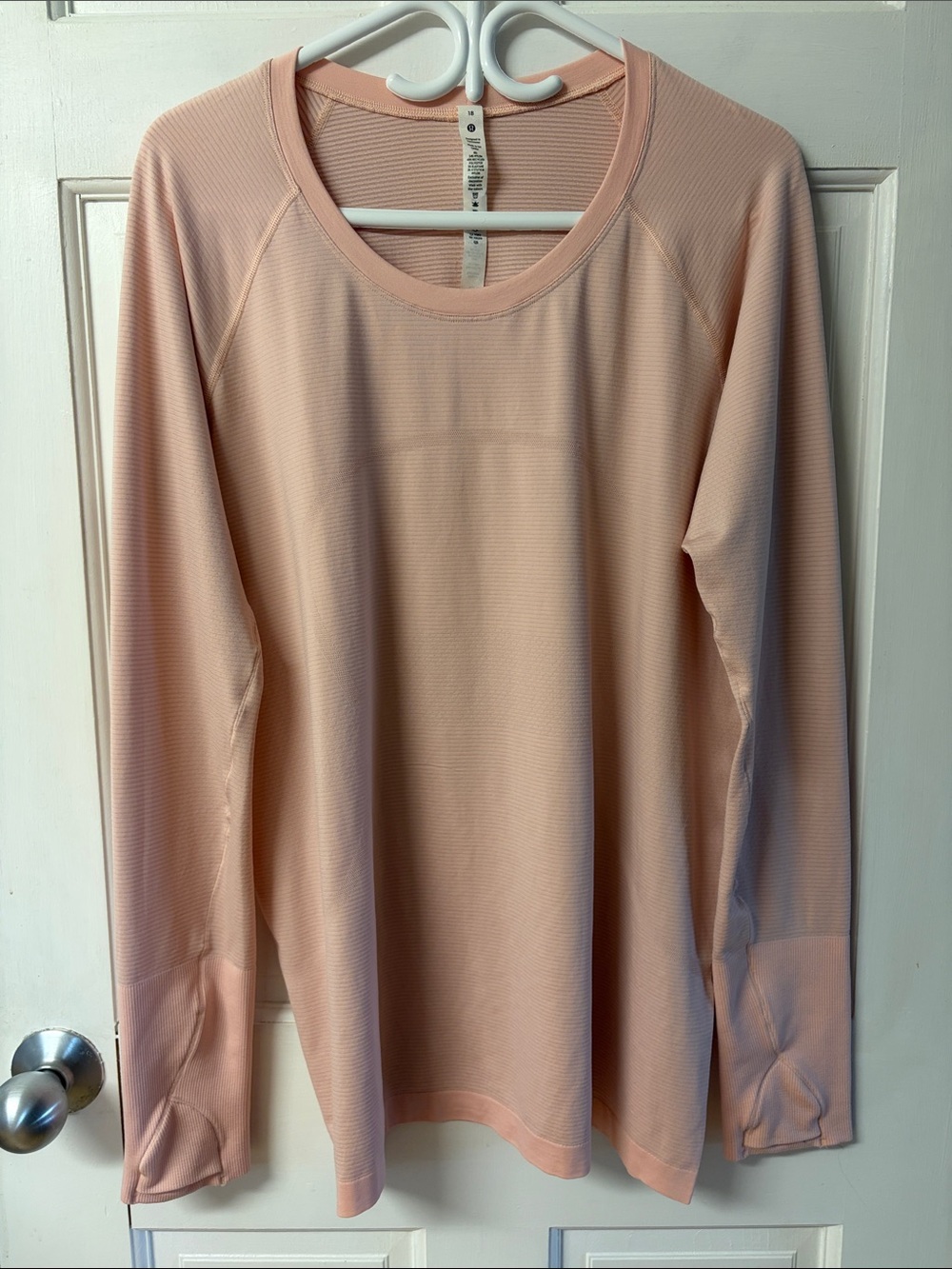 Lululemon Swiftly Tech Long-Sleeve Shirt 2.0
Hip Length in pink women’s size 18